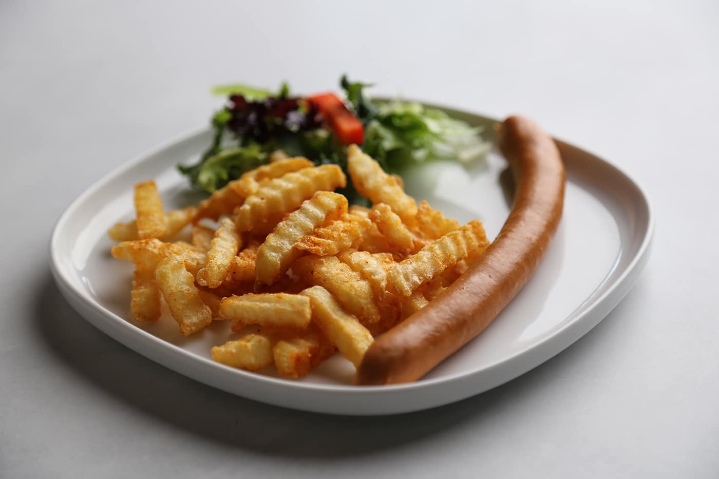 Pølse med pommes frites
